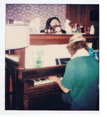Ray at Piano w hat.jpg